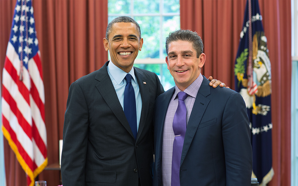 Richard Blanco poses with President Barack Obama