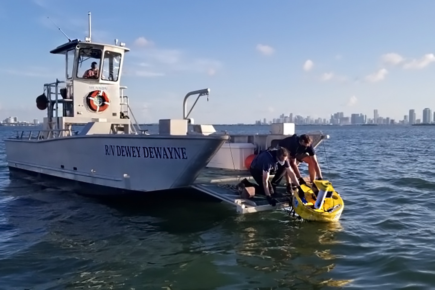 Boat on water with buoy 